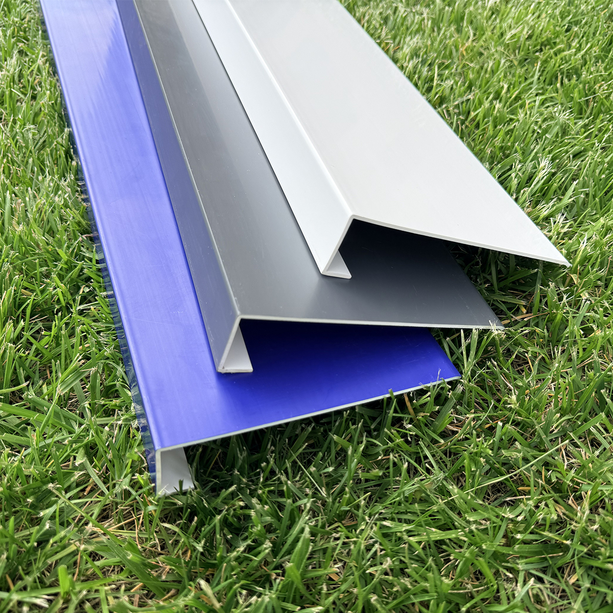 Multi-color custom rigid vinyl extrusion profiles and modular panels for industrial applications